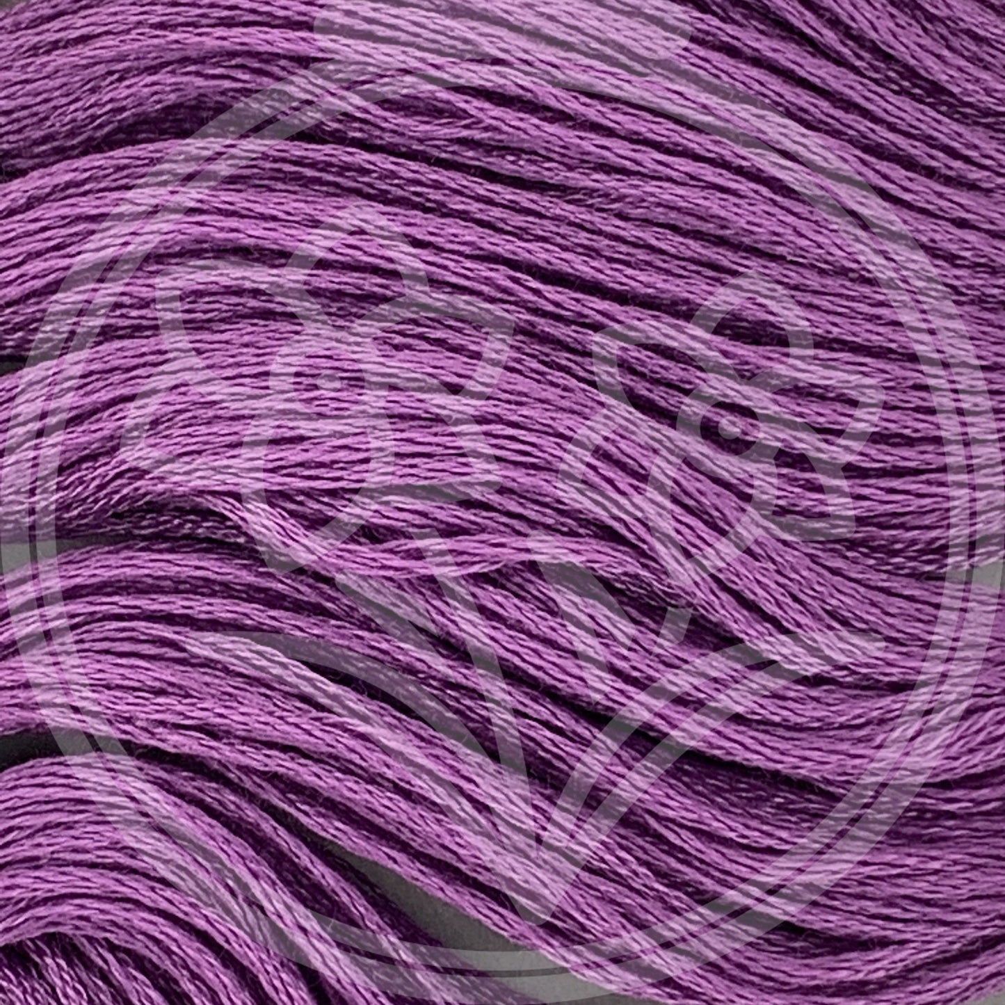 Closeup of multiple skeins, with a logo watermark