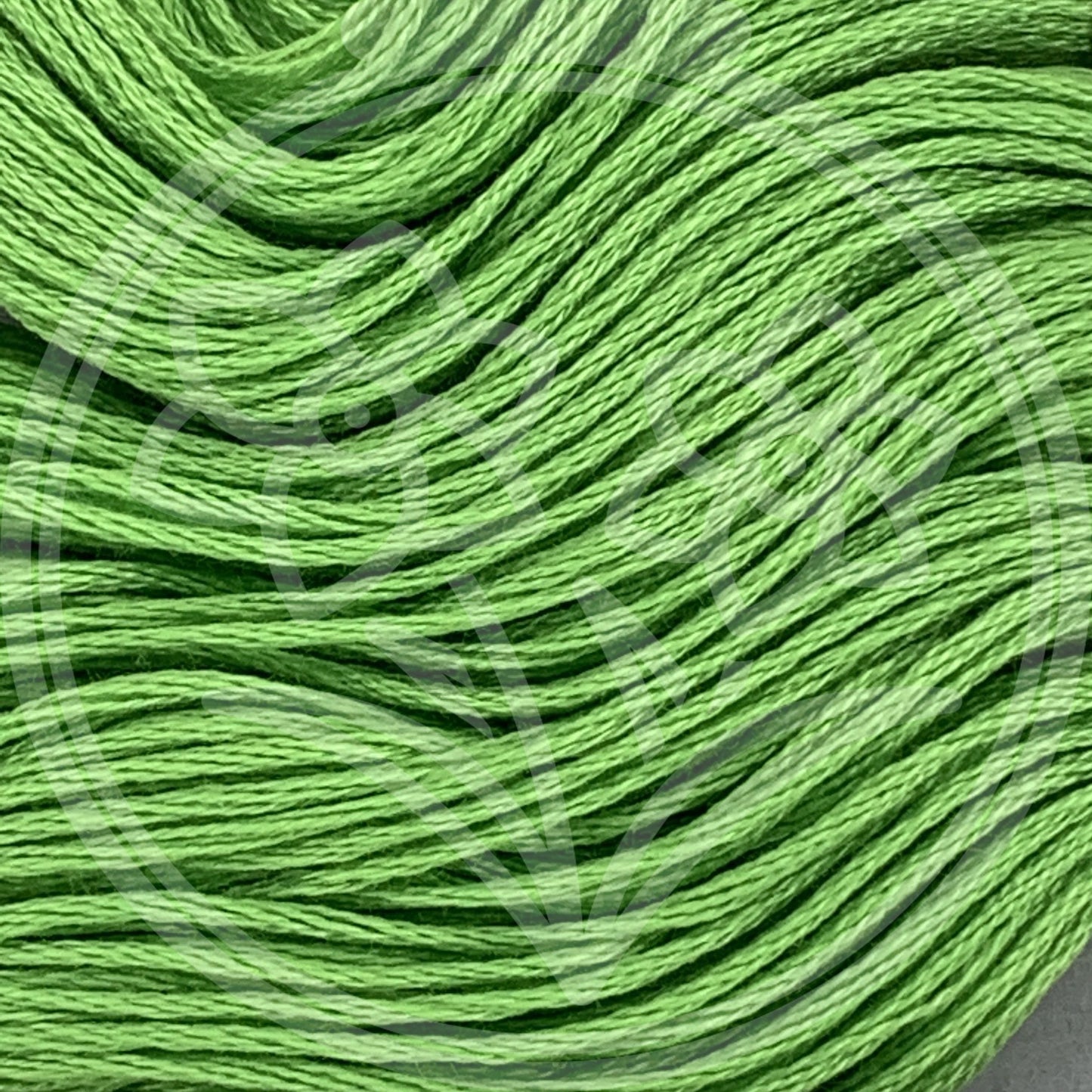 Closeup of multiple skeins, with a logo watermark