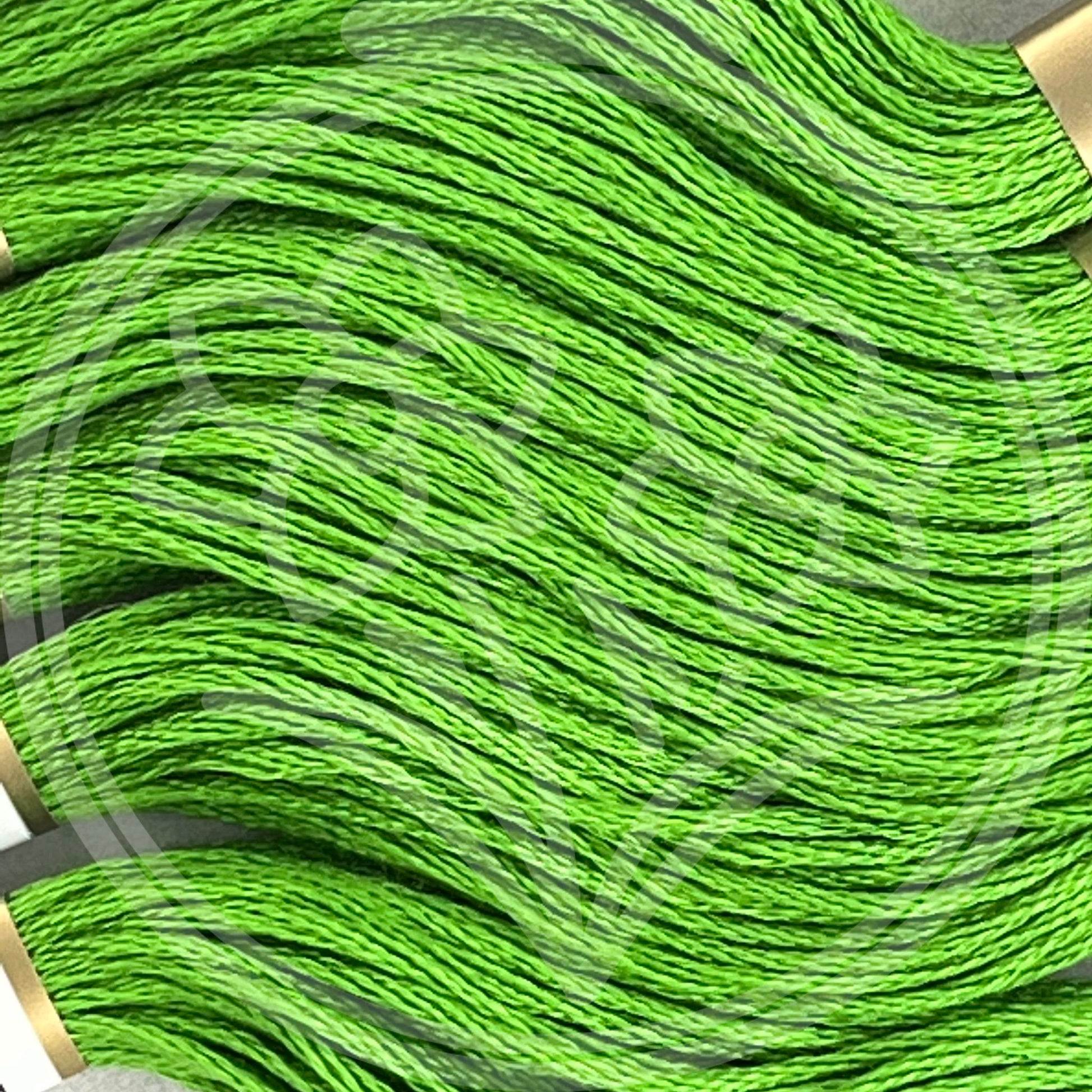 Closeup of multiple skeins, with a logo watermark