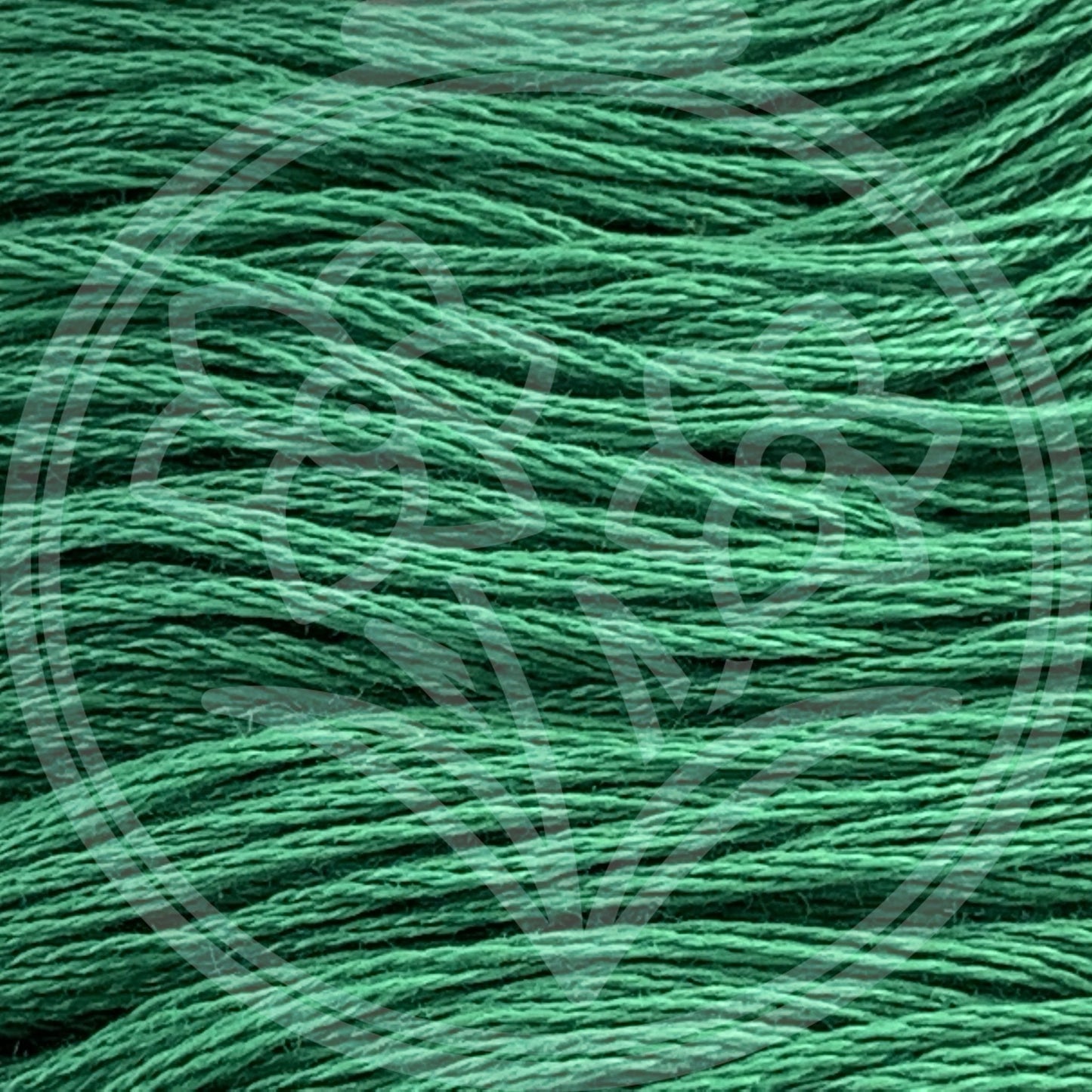 Closeup of multiple skeins, with a logo watermark