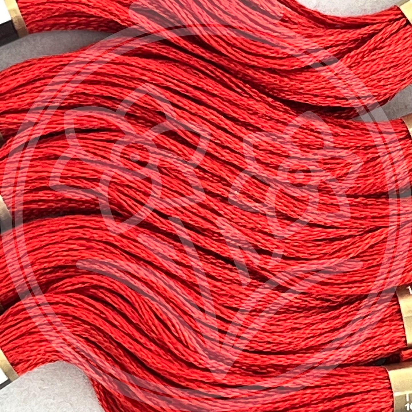 Closeup of multiple skeins, with a logo watermark