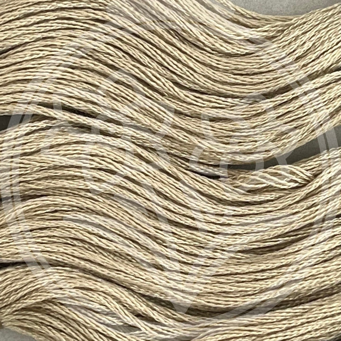 Closeup of multiple skeins, with a logo watermark