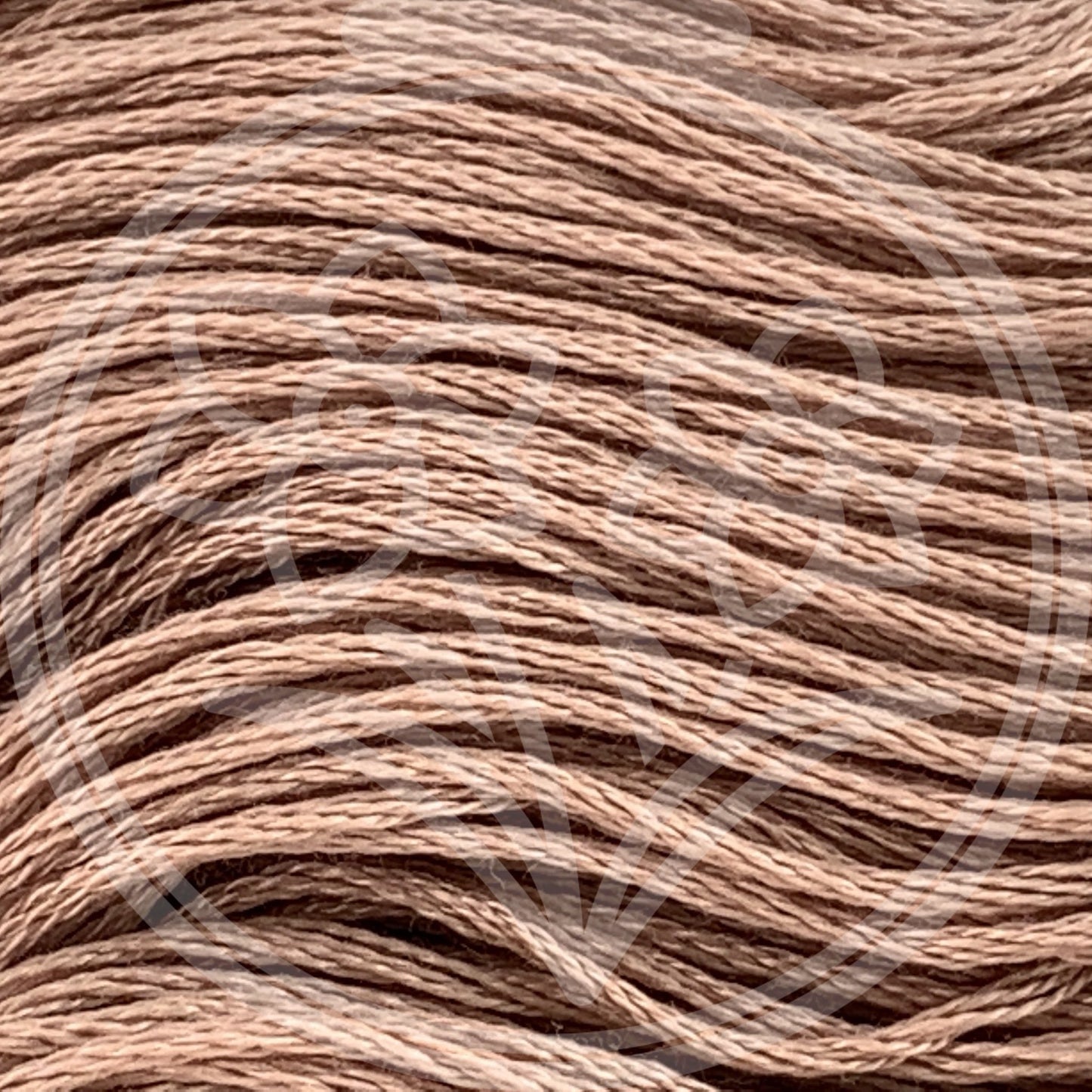 Closeup of multiple skeins, with a logo watermark