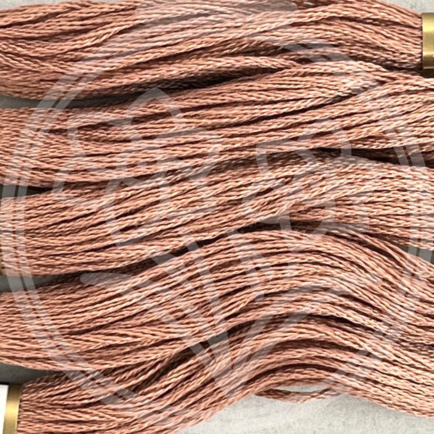 Closeup of multiple skeins, with a logo watermark