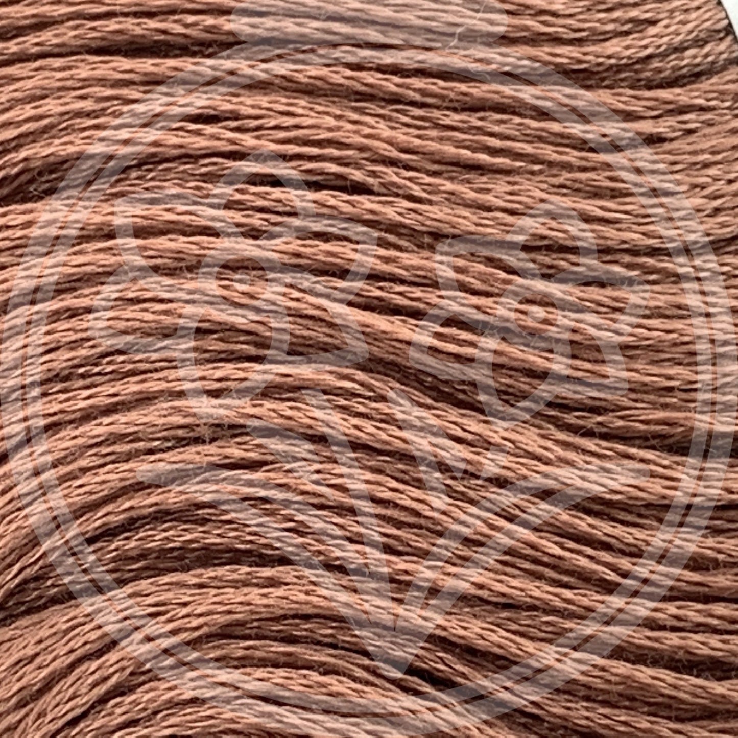 Closeup of multiple skeins, with a logo watermark