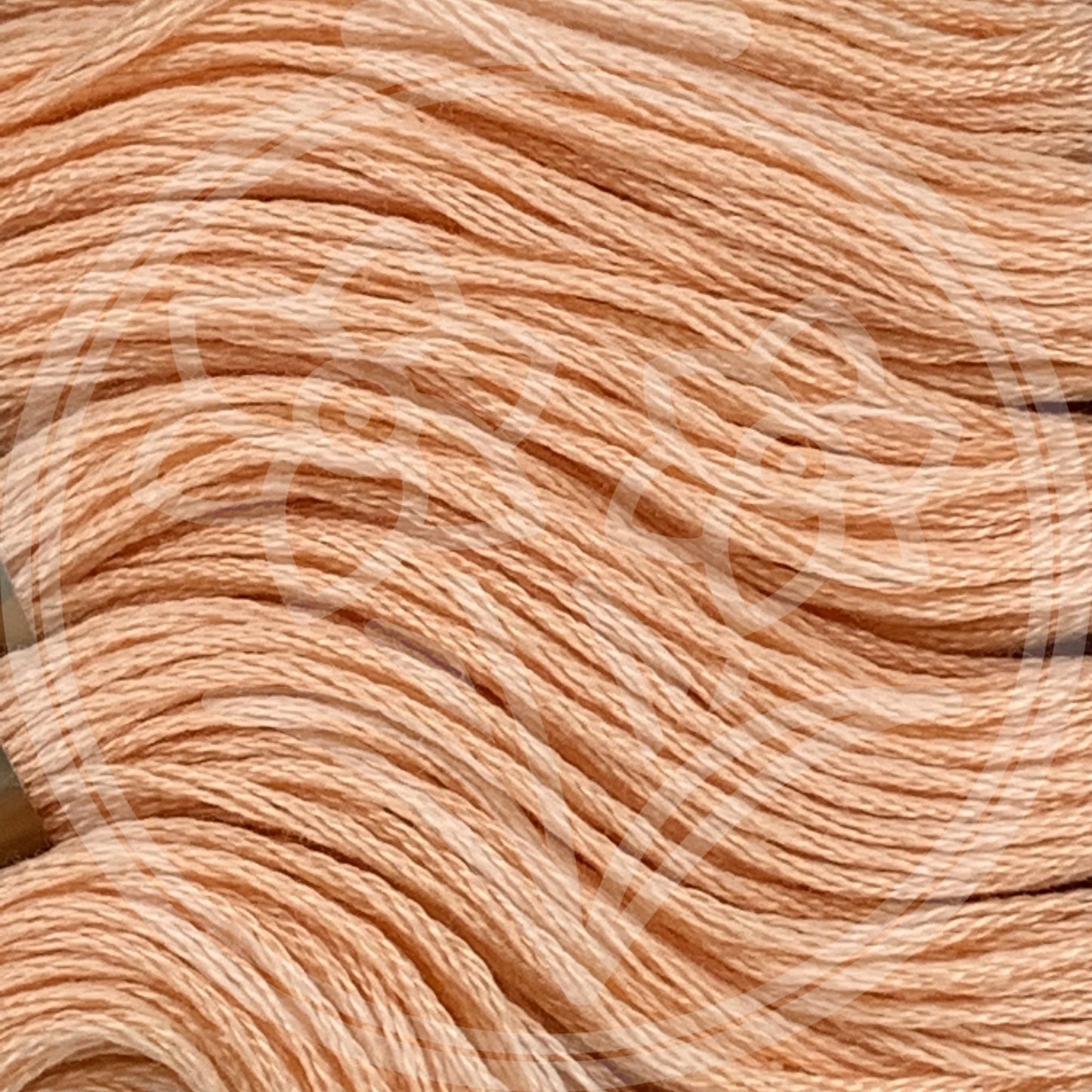 Closeup of multiple skeins, with a logo watermark