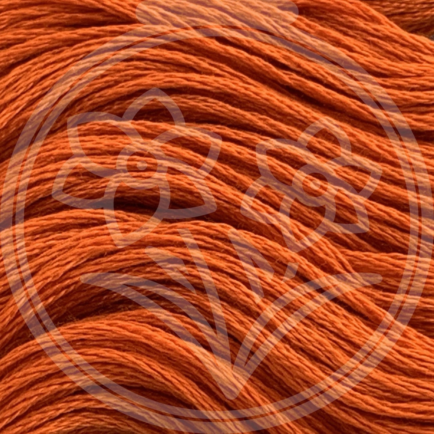 Closeup of multiple skeins, with a logo watermark