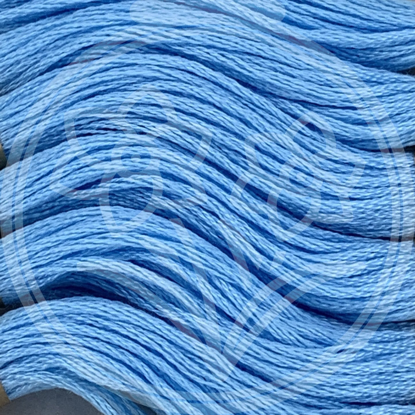 Closeup of multiple skeins, with a logo watermark