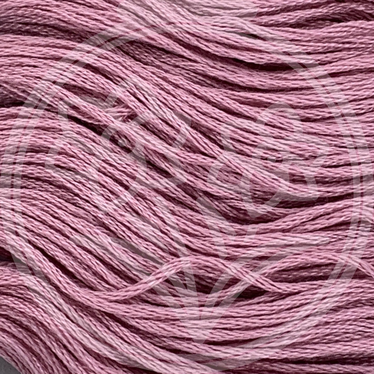 Closeup of multiple skeins, with a logo watermark