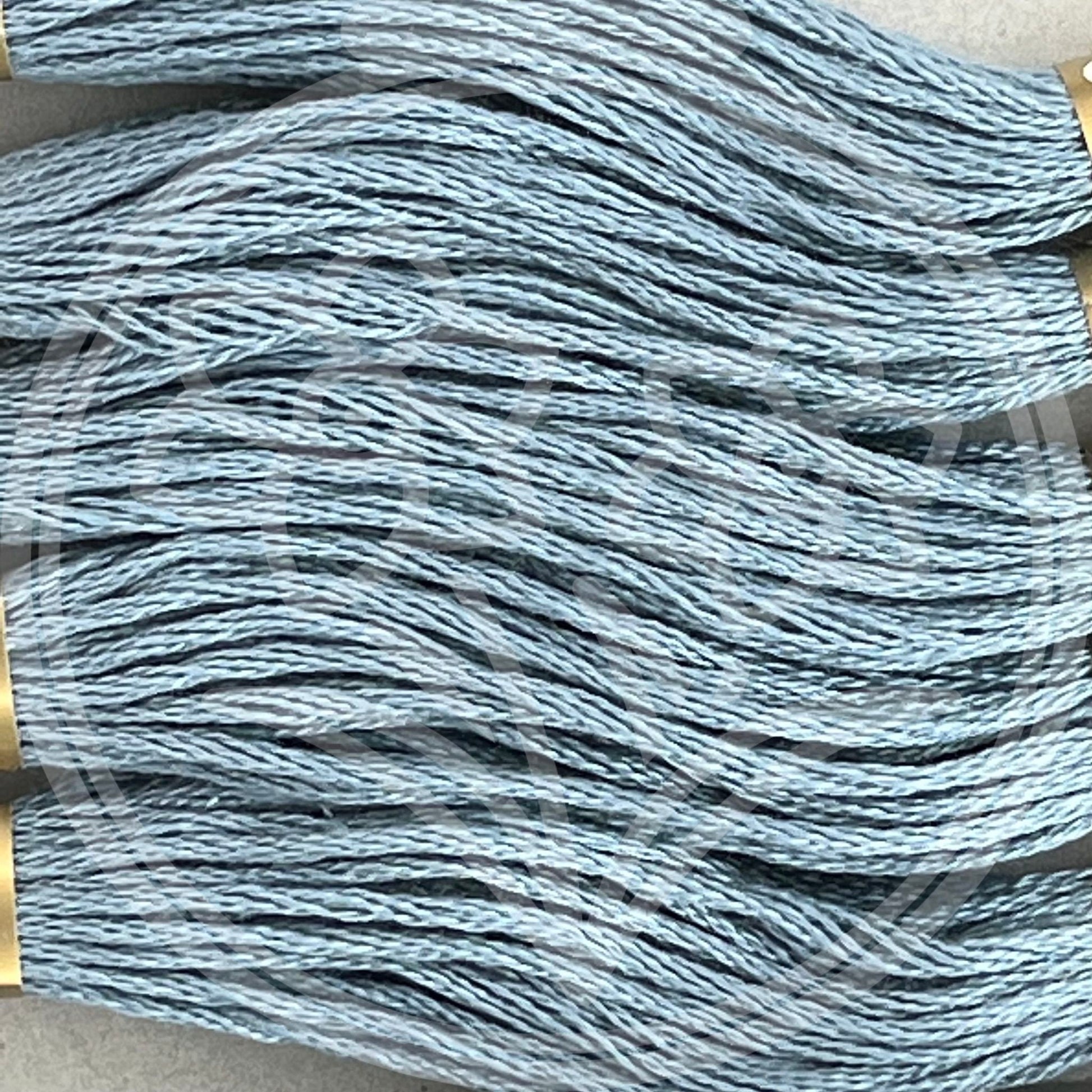 Closeup of multiple skeins, with a logo watermark