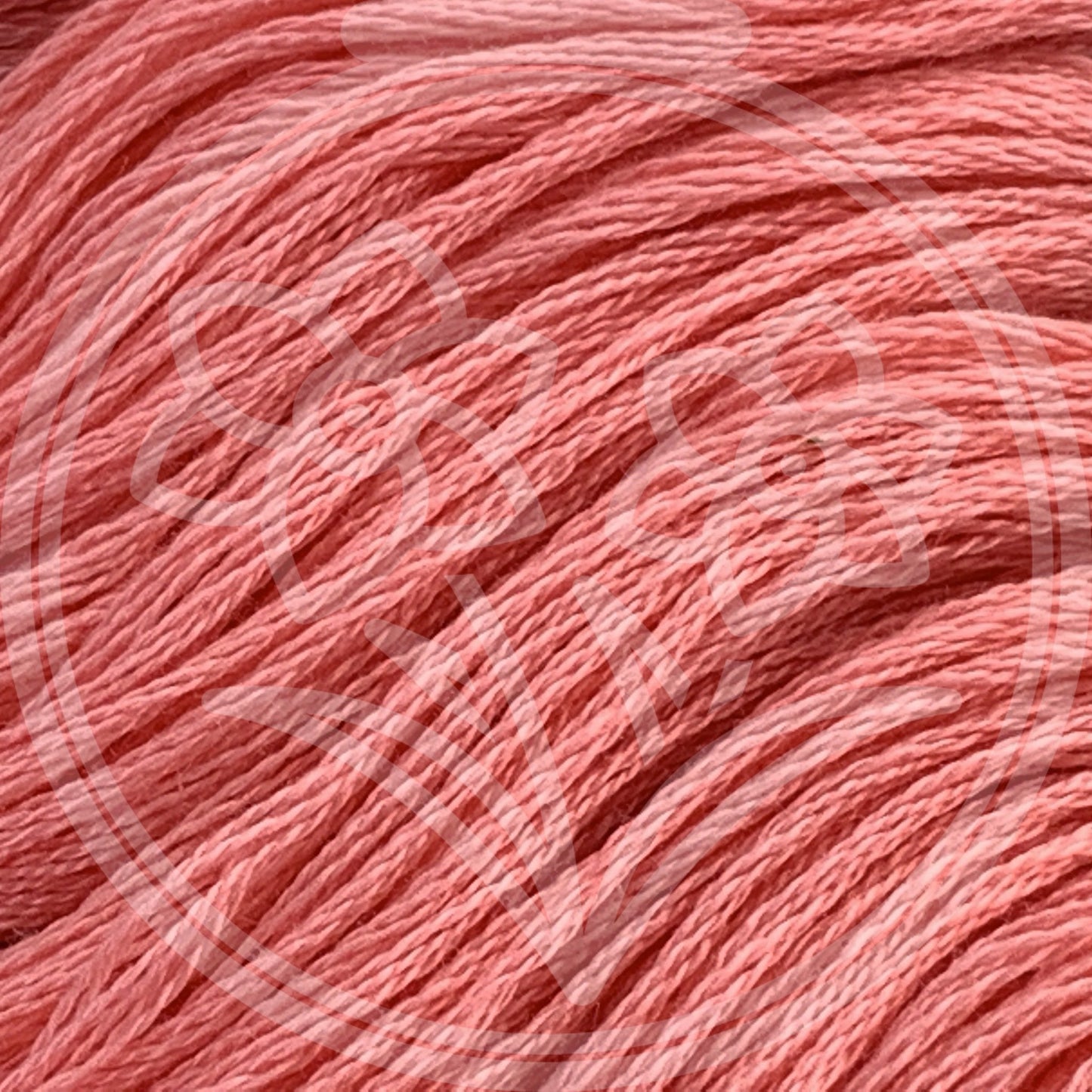 Closeup of multiple skeins, with a logo watermark