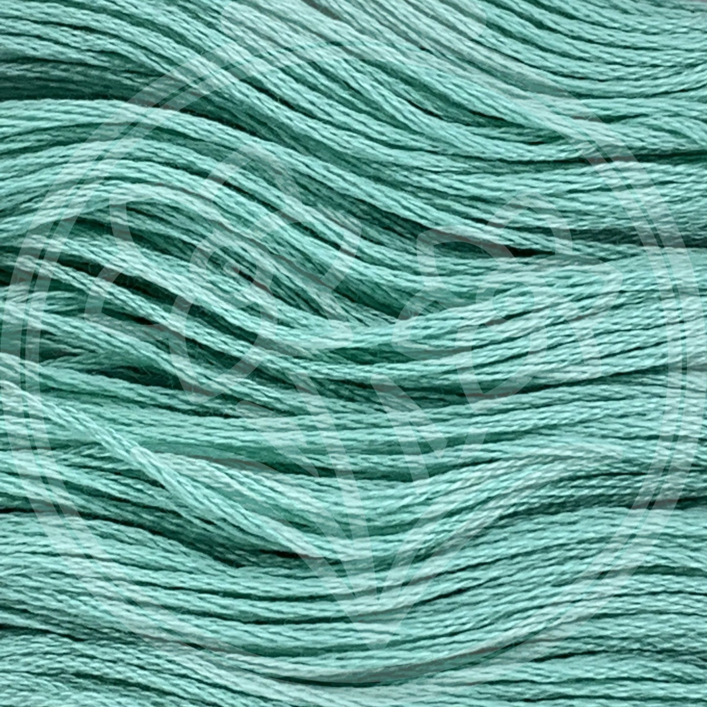 Closeup of multiple skeins, with a logo watermark