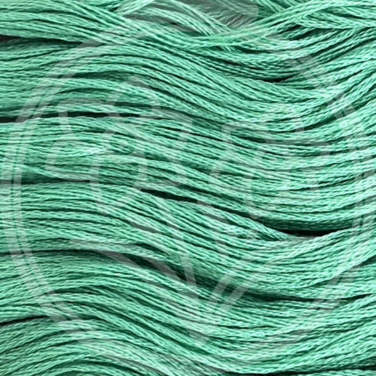Closeup of multiple skeins, with a logo watermark