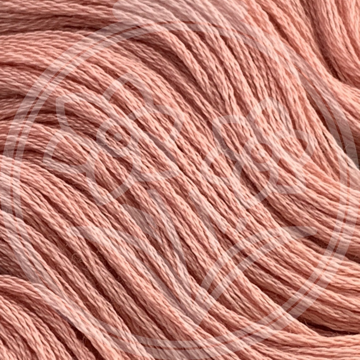 Closeup of multiple skeins, with a logo watermark
