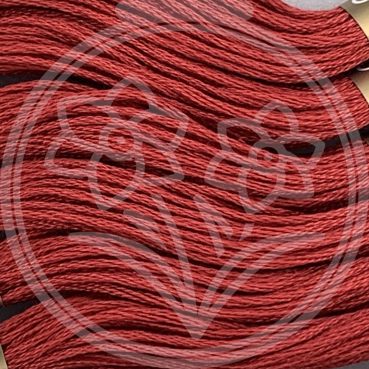 Closeup of multiple skeins, with a logo watermark