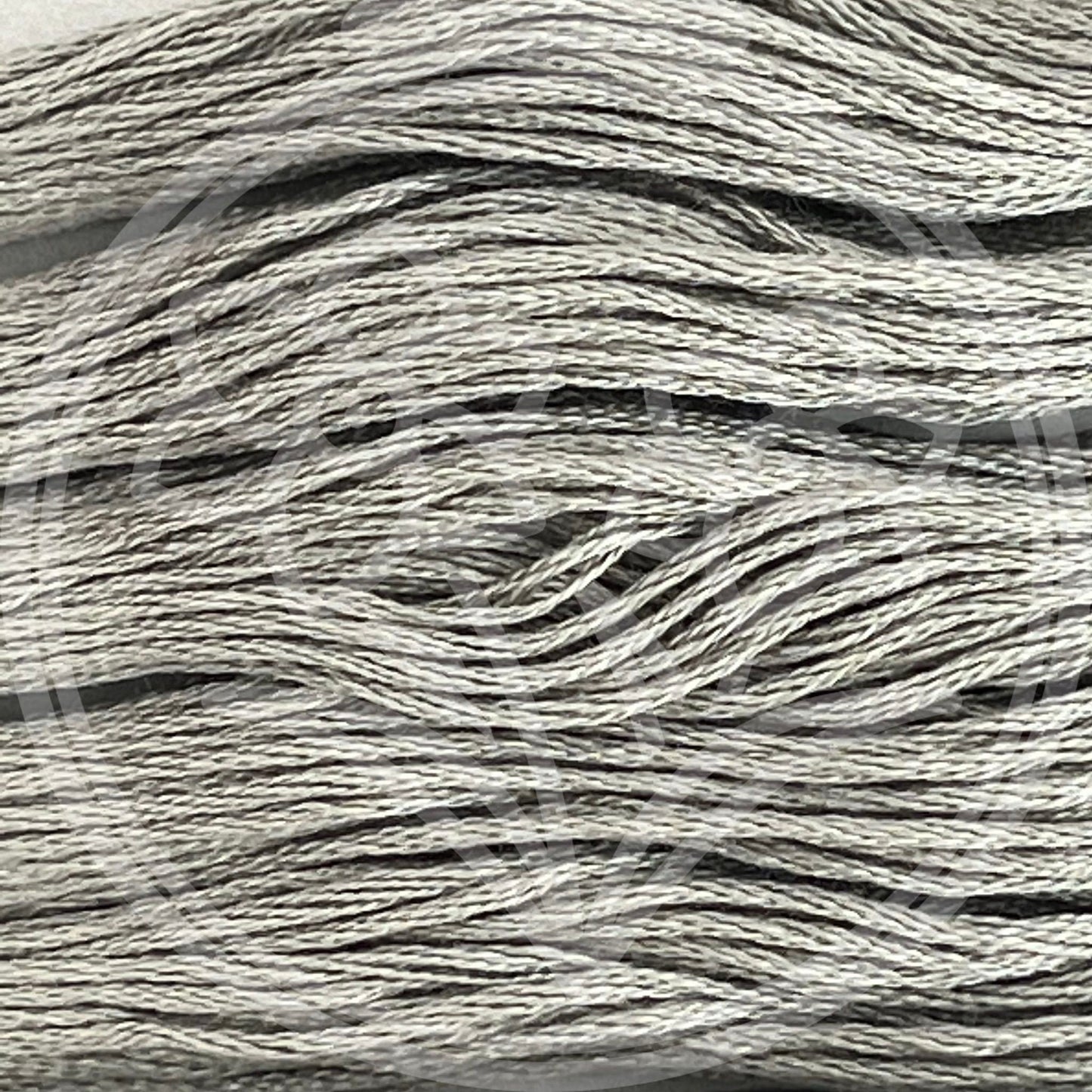 Closeup of multiple skeins, with a logo watermark