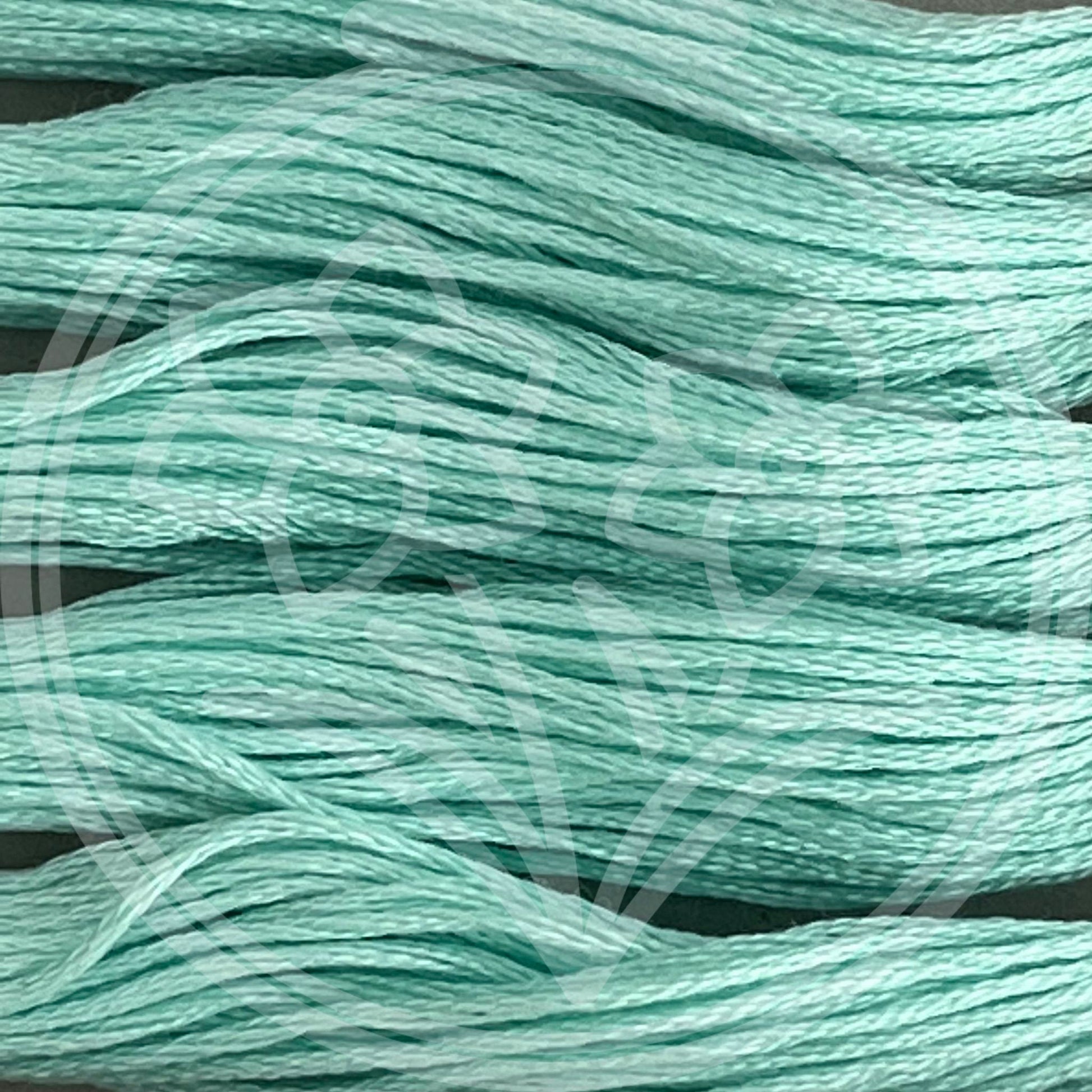 Closeup of multiple skeins, with a logo watermark